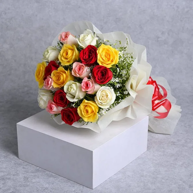 colorful rose bouquet with white wrapping by friflora