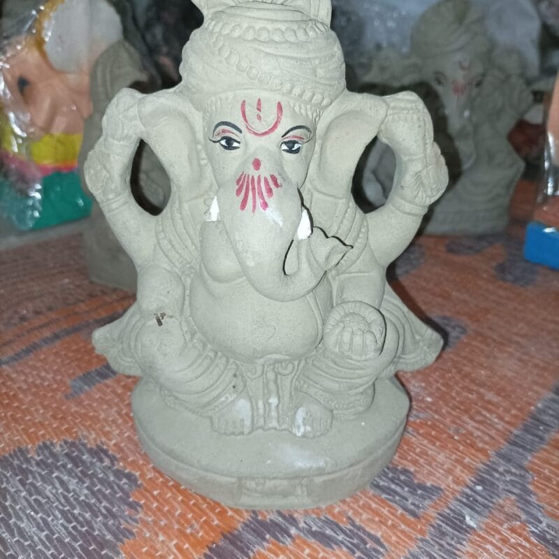 Buy Ganesh Ji Clay Idol (6 to 12 Inches) handcrafted with eco-friendly materials. Perfect for Ganesh Chaturthi, home decor, and puja rituals. Available in multiple sizes.